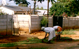 Ladies cleaning the surburb yard